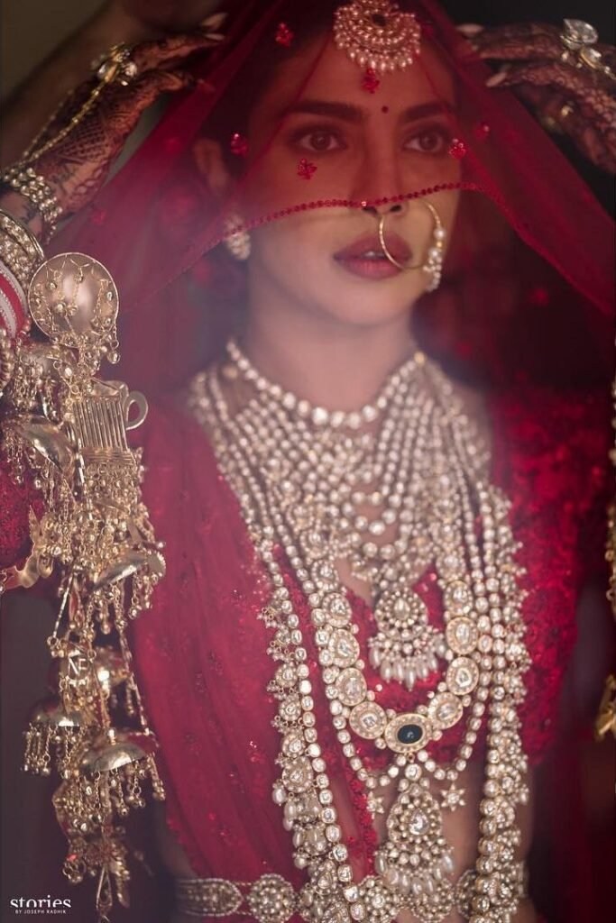 Red bridal lehenga with heavy kundan jewellery