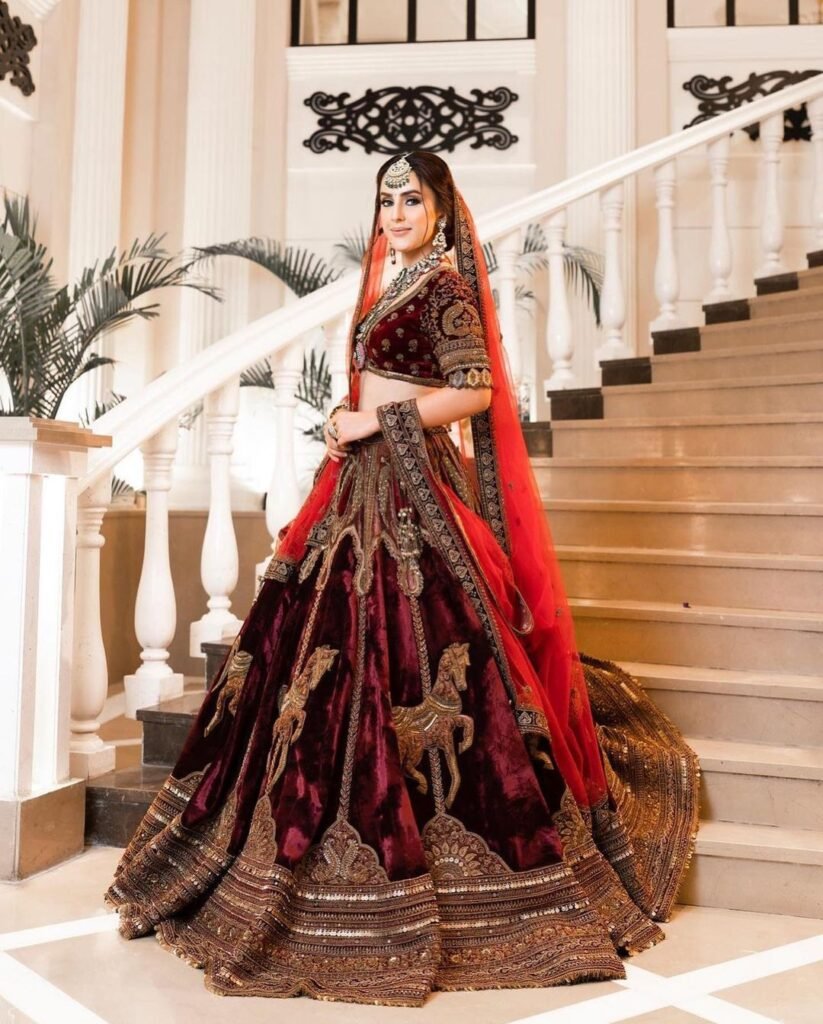 Velvet bridal lehenga in deep maroon color