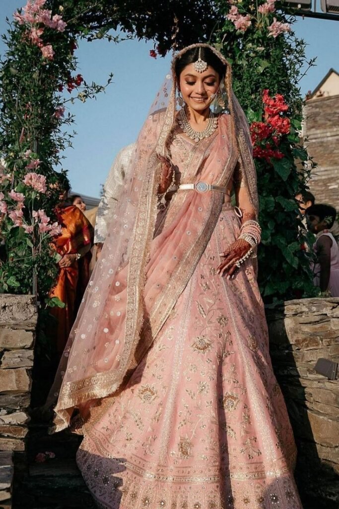 Floral bridal lehenga with pastel tones