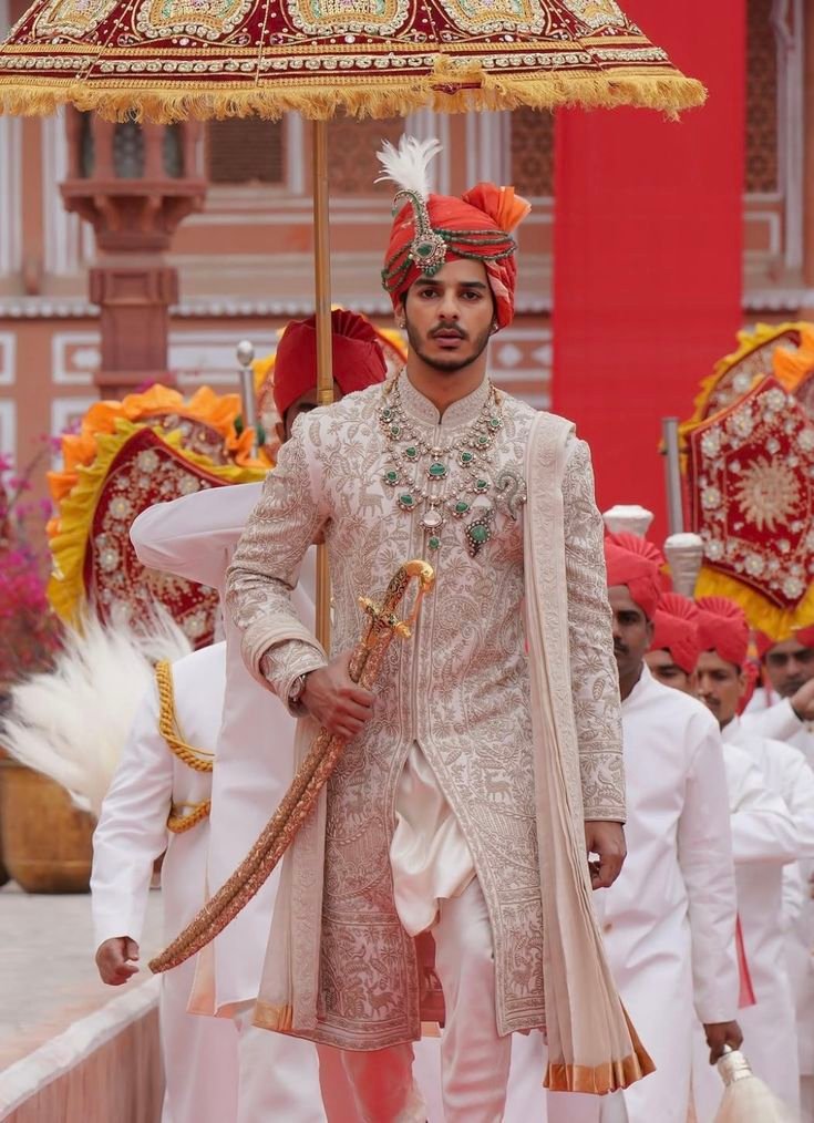 Groom wearing royal sherwani inspired by Bollywood period films