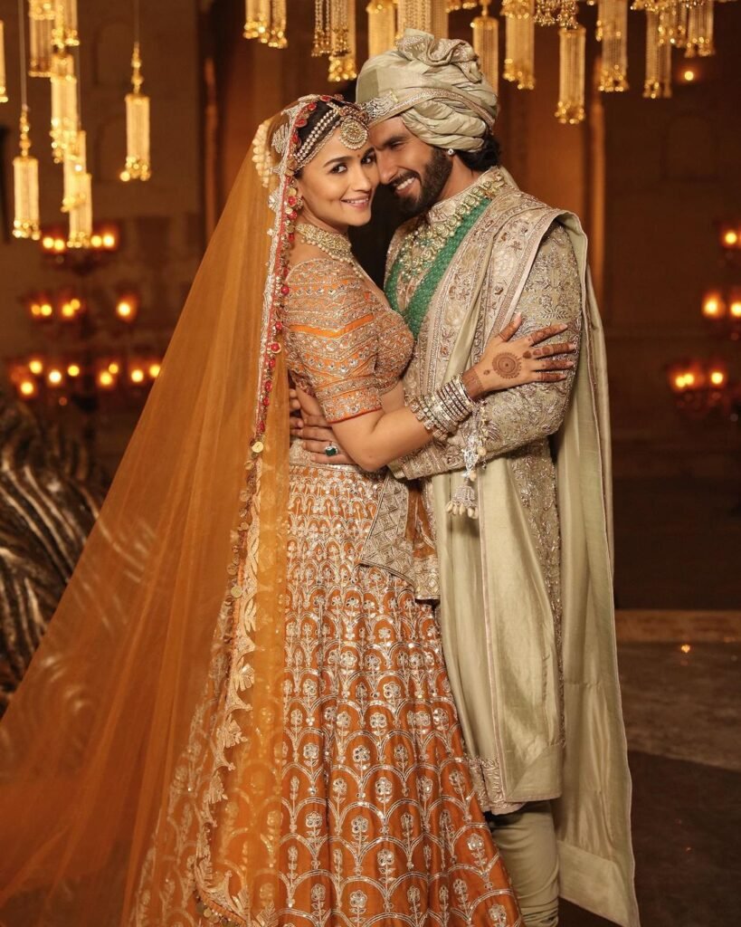 Groom wearing pastel sherwani with minimal styling