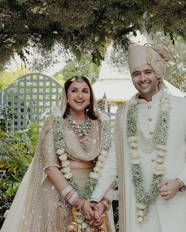  Groom posing confidently in Bollywood-inspired wedding look
