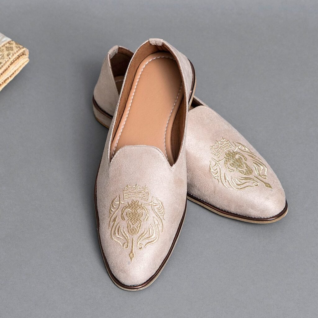 Traditional groom mojari paired with embroidered sherwani