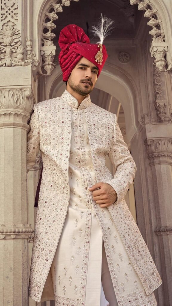 Groom sherwani with layered jacket styling