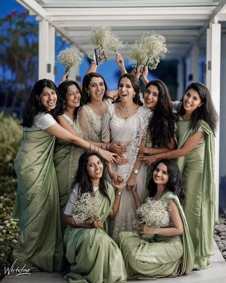 Bridesmaids in elegant pastel sarees
