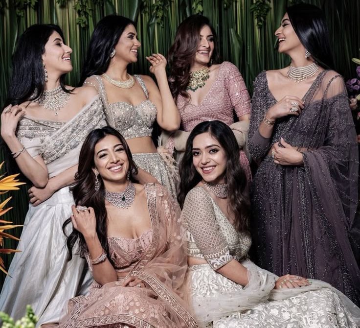 Bridesmaids dancing at sangeet in lehengas