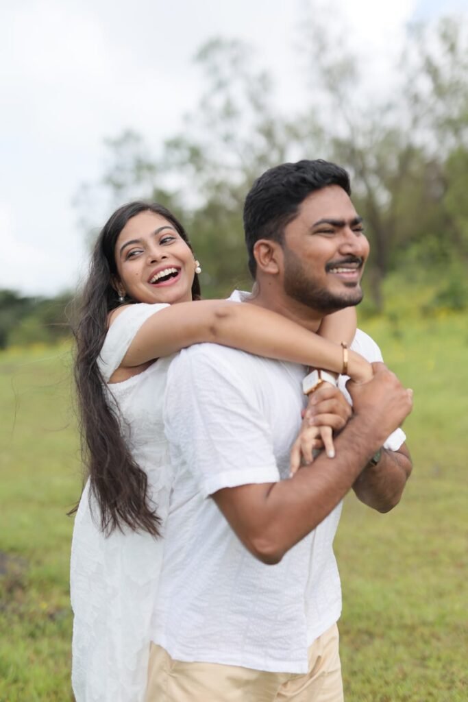 Neutral-tone pre-wedding outfits for bride and groom