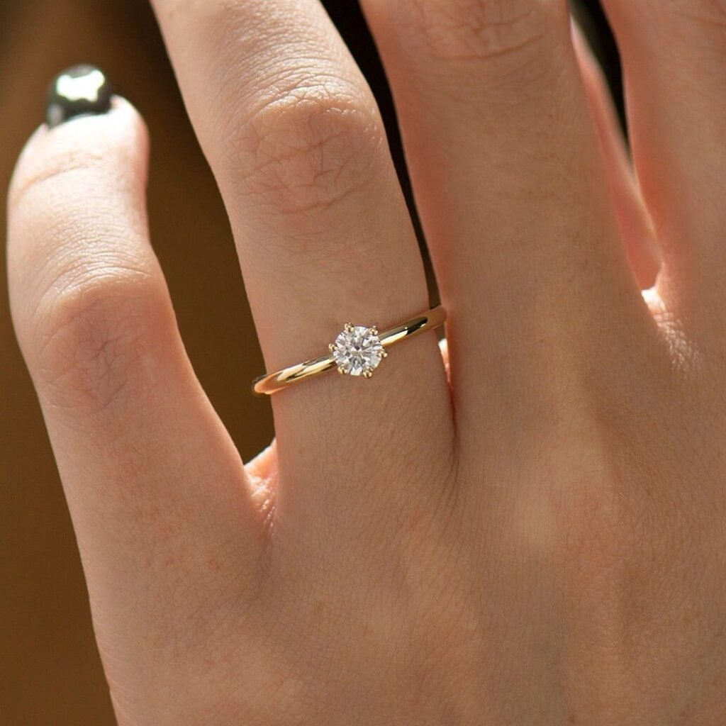 classic gold solitaire engagement ring