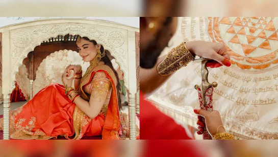 Rashmika Mandanna and Vijay Deverakonda smiling together at an award function