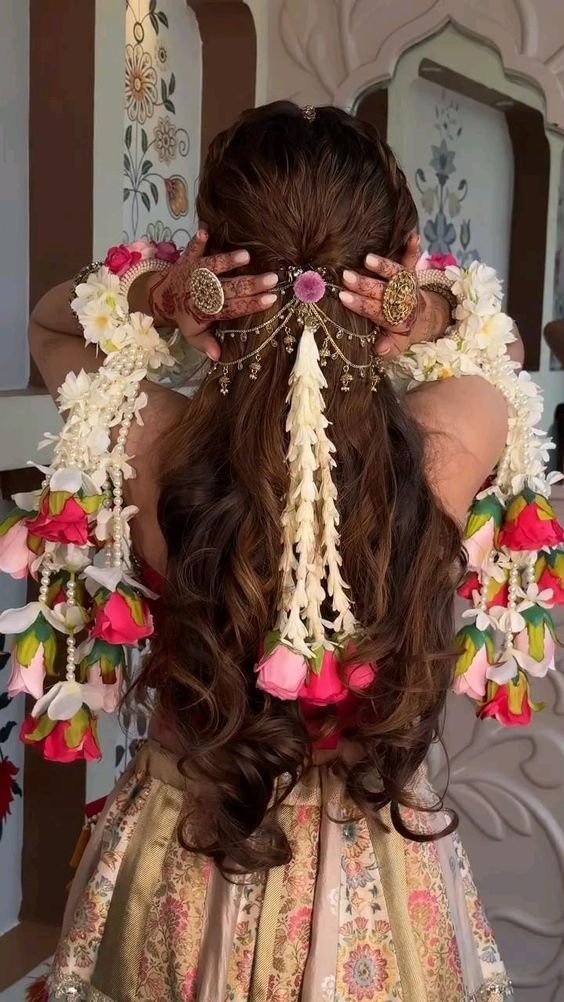  Bride with braided hairstyle decorated with flowers