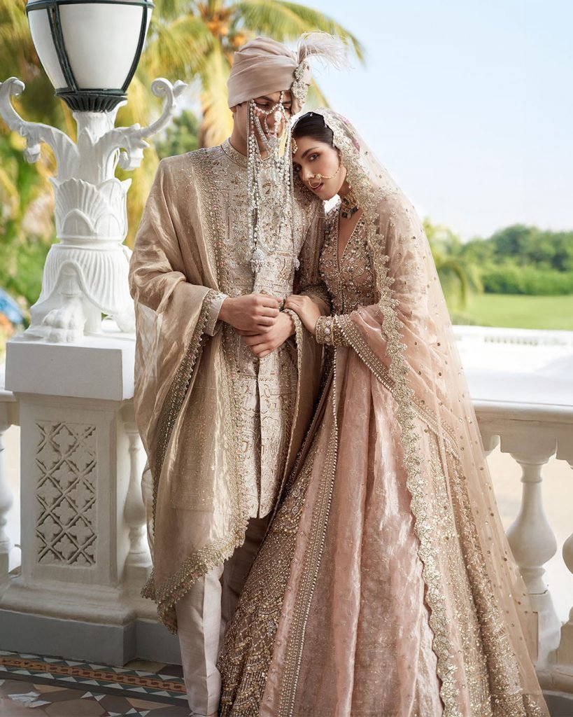 Matching embroidery on sherwani and bridal lehenga.