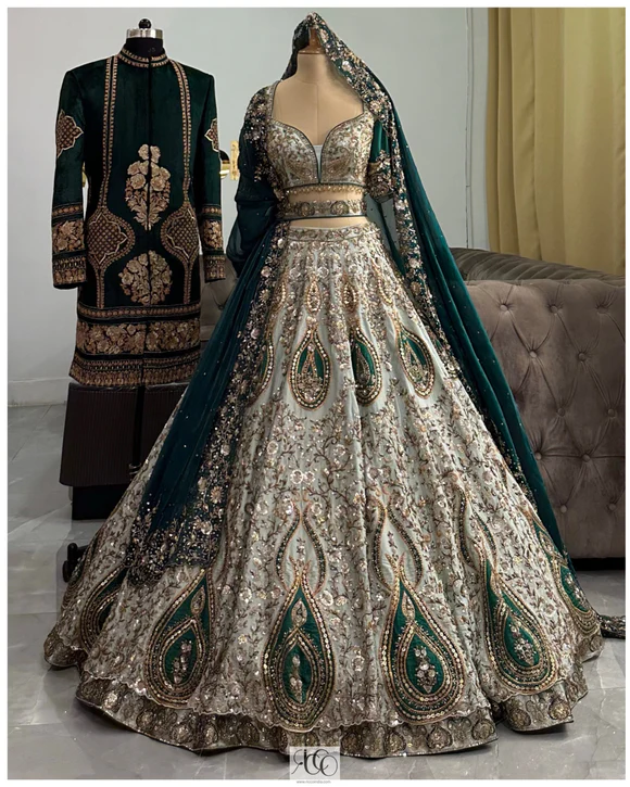 Velvet wedding sherwani with bridal velvet lehenga.